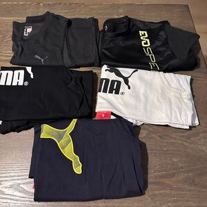 Bundle of 5 Puma Black and white workout shirts. Size Medium. 4 sleeveless, 1 te